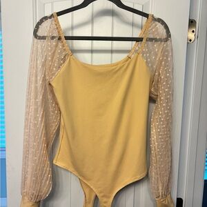 Chic Yellow Bodysuit with Sheer Polka Dot Sleeves